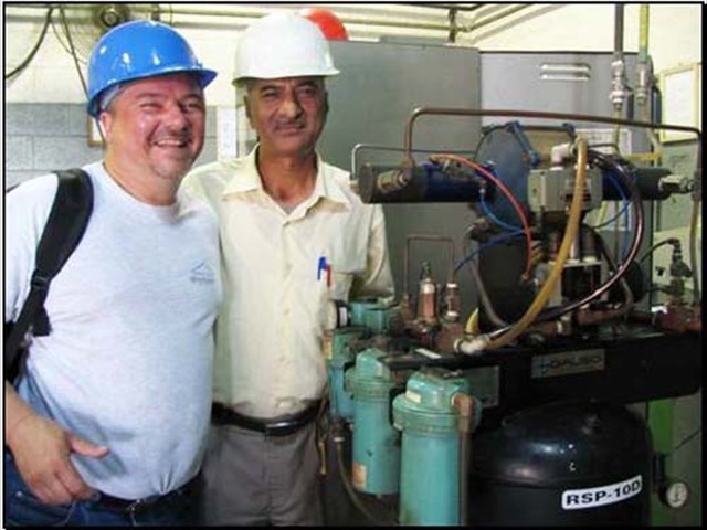 Ray with Asghar on an install, Abdullah Hashim, Saudi Arabia 